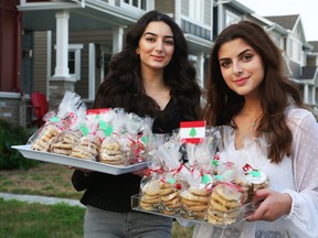 Sarah Hreich (L) and Rama El-Hakim (L) are baking and selling cookies and brownies to raise money for the Lebanese Red Cross, following the Beirut explosion.