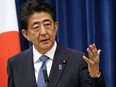 Japanese Prime Minister Shinzo Abe speaks during a press conference at the prime minister official residence in Tokyo, Japan, Friday, Aug. 28, 2020.