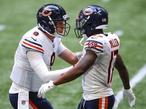 Anthony Miller #17 celebrates his touchdown with Nick Foles of the Chicago Bears in the fourth quarter of an NFL game against the Atlanta Falcons at Mercedes-Benz Stadium on Sept. 27, 2020 in Atlanta.