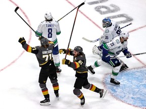 Mark Stone of the Vegas Golden Knights celebrates a goal by teammate Shea Theodore (not pictured) against the Vancouver Canucks that decided Game 7 in the second-round series.
