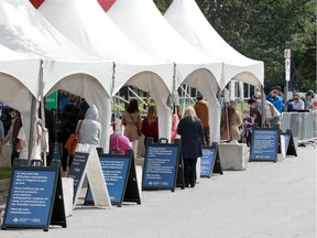 Long lineups at Brewer Park's COVID-19 assessment centre Monday. In fact, cars were lined up at times out to Bronson Avenue.