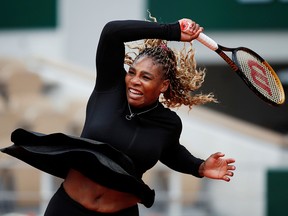 Serena Williams in action during her first-round French Open match against Kristie Ahn.