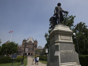 A Sir John A. Macdonald statue stands in front of Queen's Park in downtown Toronto, July 8, 2019.