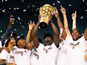 The Edmonton Stingers hoist the Canadian Elite Basketball League championship trophy after the league’s Summer Series in St. Catharines on Aug. 9. The 16-day tournament, held in response to the pandemic, provides a case study as leagues wrestle with how to showcase their products in uncertain times.