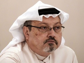 In this file photo taken Dec. 15, 2014, Saudi journalist Jamal Khashoggi attends a press conference in the Bahraini capital Manama.
