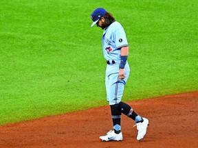 Blue Jays infielder Bo Bichette reacts after committing one of his two errors in the second inning against the Tampa Bay Rays at Tropicana Field on Wednesday..