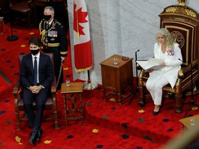 Gov. Gen. Julie Payette  delivers the Throne Speech in the Senate as Prime Minister Justin Trudeau listens.