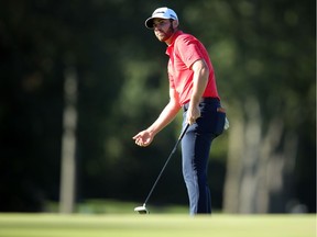 Matthew Wolff reacts to his putt on the 13th green during the third round of the U.S. Open golf tournament at Winged Foot Golf Club - West.