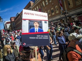 Gun owners from across the country gathered on Parliament Hill and held a march down Sparks Street Saturday.