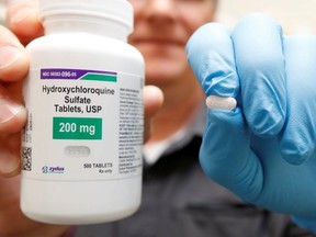 The drug hydroxychloroquine, pushed by U.S. President Donald Trump and others in recent months as a possible treatment to people infected with the coronavirus disease (COVID-19), is displayed by a pharmacist at the Rock Canyon Pharmacy in Provo, Utah, U.S., May 27, 2020.