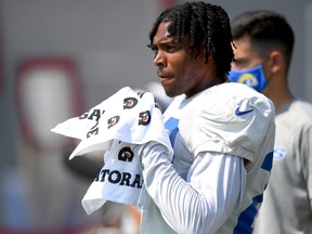 Cornerback Jalen Ramsey of the Los Angeles Rams looks on from the sidelines during training camp on Aug. 19, 2020 at the practice facility at in Thousand Oaks, Calif.