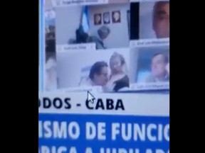 During a special meeting of Argentina's deputies, with a few lawmakers in physical attendance but most others appearing via large screens in the chamber, politician Juan Ameri appeared on a screen sitting with his wife, before performing a lewd act.