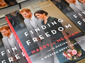 Copies of ‘Finding Freedom,’ an unofficial biography on Prince Harry and Meghan Markle, the Duke and Duchess of Sussex, are seen on display at a Waterstones bookshop in London, Britain Aug. 12, 2020.