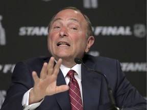 In this May 27, 2019, file photo, NHL Commissioner Gary Bettman speaks to the media before Game 1 of the NHL hockey Stanley Cup Finals.