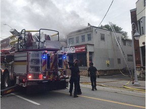 October 22, 2020. Ottawa Fire Services is on scene battling a fire on the upper floor of a building at 270 Preston St.