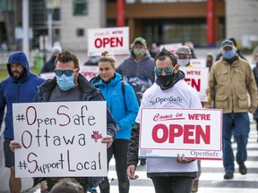 OpenSafe Ottawa held a rally by local business that started at City Hall, Saturday October 24, 2020.
