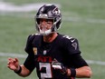 Matt Ryan of the Atlanta Falcons runs the offense against the Carolina Panthers during the second half at Mercedes-Benz Stadium on October 11, 2020 in Atlanta, Georgia.