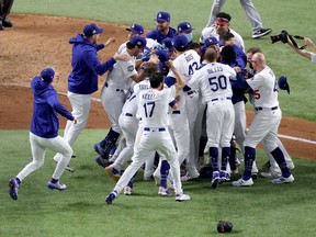 The Los Angeles Dodgers celebrate after defeating the Tampa Bay Rays in Game 6 to win the MLB World Series at Globe Life Field on Oct. 27, 2020 in Arlington, Texas. Now that baseball's done, there's not a whole lot to look forward to in terms of pro sports.