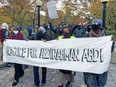 Justice for Abdirahman took to the streets and blocked Elgin Street at Laurier Avenue on Oct. 20, 2020