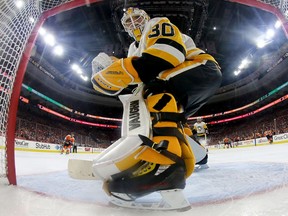 Goaltender Matt Murray of the Pittsburgh Penguins follows the puck as he defends his net.