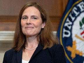 U.S. Supreme Court nominee Judge Amy Coney Barrett poses for a photo on Capitol Hill in Washington, D.C., Oct. 21, 2020.