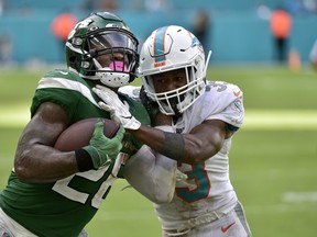 Le'Veon Bell (left) was cut by the Jets on Tuesday night and has as many as six potential landing spots, according to a report, including in Buffalo or Chicago.