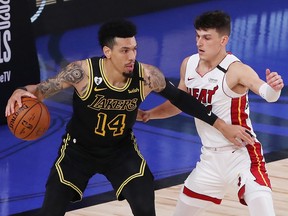 Danny Green of the Los Angeles Lakers drives the ball against Tyler Herro of the Miami Heat during Game 5 of the 2020 NBA Finals at AdventHealth Arena at the ESPN Wide World Of Sports Complex on October 9, 2020 in Lake Buena Vista, Florida.