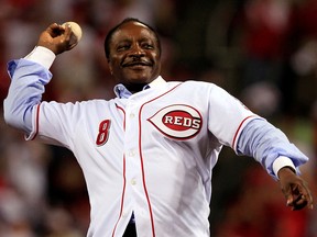 Cincinnati Reds great Joe Morgan throws out the ceremonial first pitch in Cincinnati, Ohio October 10, 2010.