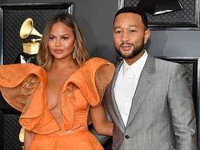 Chrissy Teigen and John Legend attend the 62nd Annual Grammy Awards at Staples Center on January 26, 2020 in Los Angeles.