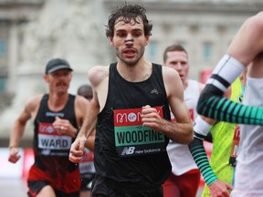 Canada's Tristan Woodfine runs during the London Marathon on Oct. 4.