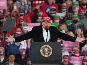 U.S. President Donald Trump speaks to supporters during a rally at the Des Moines International Airport on Oct. 14, 2020 in Des Moines, Iowa.