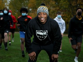 Victor Tedondo with some of his players at the Gridiron Academy.