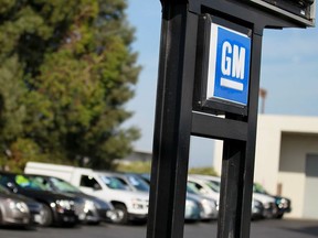 The General Motors logo is displayed at Boardwalk Chevrolet on November 9, 2011 in Redwood City, California. General Motors reported a 12 percent decline in third quarter profits earnings of $1.73 billion, or $1.03 a share, down from $1.96 billion, or $1.20 a share one year ago.