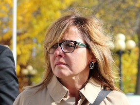 Pembroke dentist Christy Natsis leaves the Pembroke courthouse on Wednesday, Oct. 14, 2015. She apologized for the 2011 drunk driving crash that killed Bryan Casey.