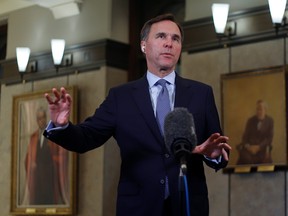 Minister of Finance Bill Morneau answers a question during a television interview about the Economic and Fiscal Snapshot on Parliament Hill in Ottawa, July 8, 2020.