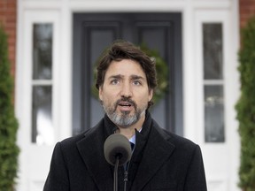 Prime Minister Justin Trudeau speak to the media about the COVID-19 virus outside Rideau Cottage in Ottawa, Friday, Nov. 20, 2020.