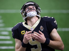 Drew Brees of the New Orleans Saints reacts following a play during their game against the San Francisco 49ers at Mercedes-Benz Superdome on November 15, 2020 in New Orleans.