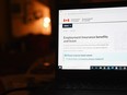 The employment insurance section of the Government of Canada website is shown on a laptop in Toronto on April 4, 2020.