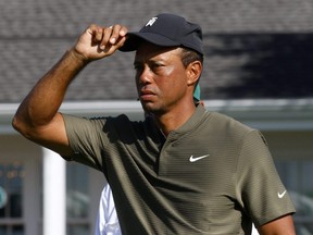 Tiger Woods of the U.S. walks to the 10th tee during the first round of The Masters on Nov. 12, 2020.