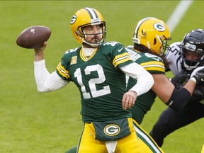 Green Bay Packers quarterback Aaron Rodgers throws a pass against the Jacksonville Jaguars during the second quarter at Lambeau Field.
