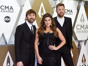 Lady A, formerly known as Lady Antebellum, will not attend the CMA Awards in Nashville on Wednesday night after a family member tested positive for COVID-19. Charles Pulliam / REUTERS / FILES