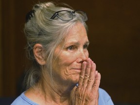 Leslie Van Houten reacts after hearing she is eligible for parole during a hearing on Wednesday, Sept. 6, 2017, at the California Institution for Women in Corona, Calif.