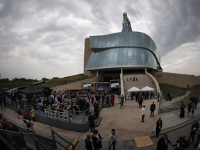 Guests gather at the grand opening of the Canadian Museum For Human Rights in Winnipeg on Friday, Sept. 7, 2014. The museum has laid out a plan to move forward after allegations of racism, homophobia and censorship.