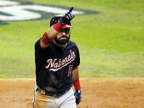 Adam Eaton of the Washington Nationals celebrates after he hits a solo home run against the Houston Astros during the fifth inning in Game Six of the 2019 World Series at Minute Maid Park on October 29, 2019 in Houston, Texas.