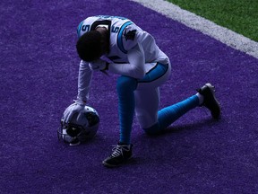 Teddy Bridgewater of the Carolina Panthers prays in the end zone before the game against the Minnesota Vikings at U.S. Bank Stadium on Nov. 29, 2020 in Minneapolis, Minn.