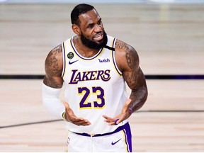 LeBron James of the Los Angeles Lakers reacts against the Miami Heat in Game Six of the 2020 NBA Finals at AdventHealth Arena at the ESPN Wide World Of Sports Complex on October 11, 2020 in Lake Buena Vista, Florida.