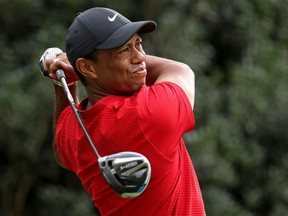 Tiger Woods plays his shot from the 15th tee during the final round of the Masters at Augusta National Golf Club on November 15, 2020 in Augusta, Georgia.