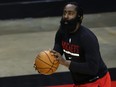 James Harden of the Houston Rockets warms up prior to facing the San Antonio Spurs at the Toyota Center on Dec. 17, 2020 in Houston, Texas.