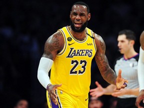 Los Angeles Lakers forward LeBron James (23) reacts during a game against the Milwaukee Bucks at Staples Center.