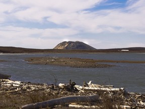 A ice-cored pingo rises above the surrounding tundra near Tuktoyaktuk, Northwest Territories.